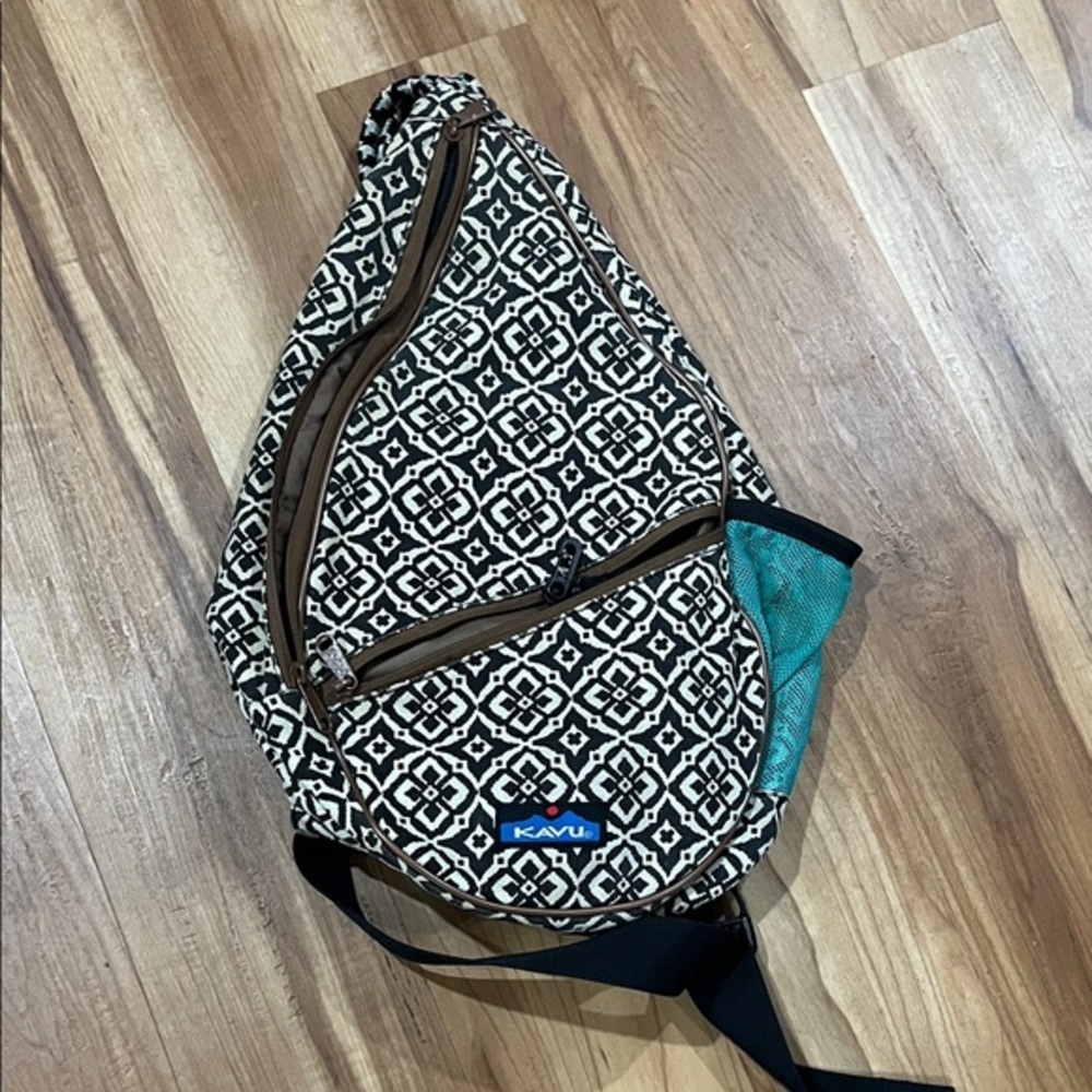 Kavu Dark Brown Patterned Backpack with Teal Cup Holder.